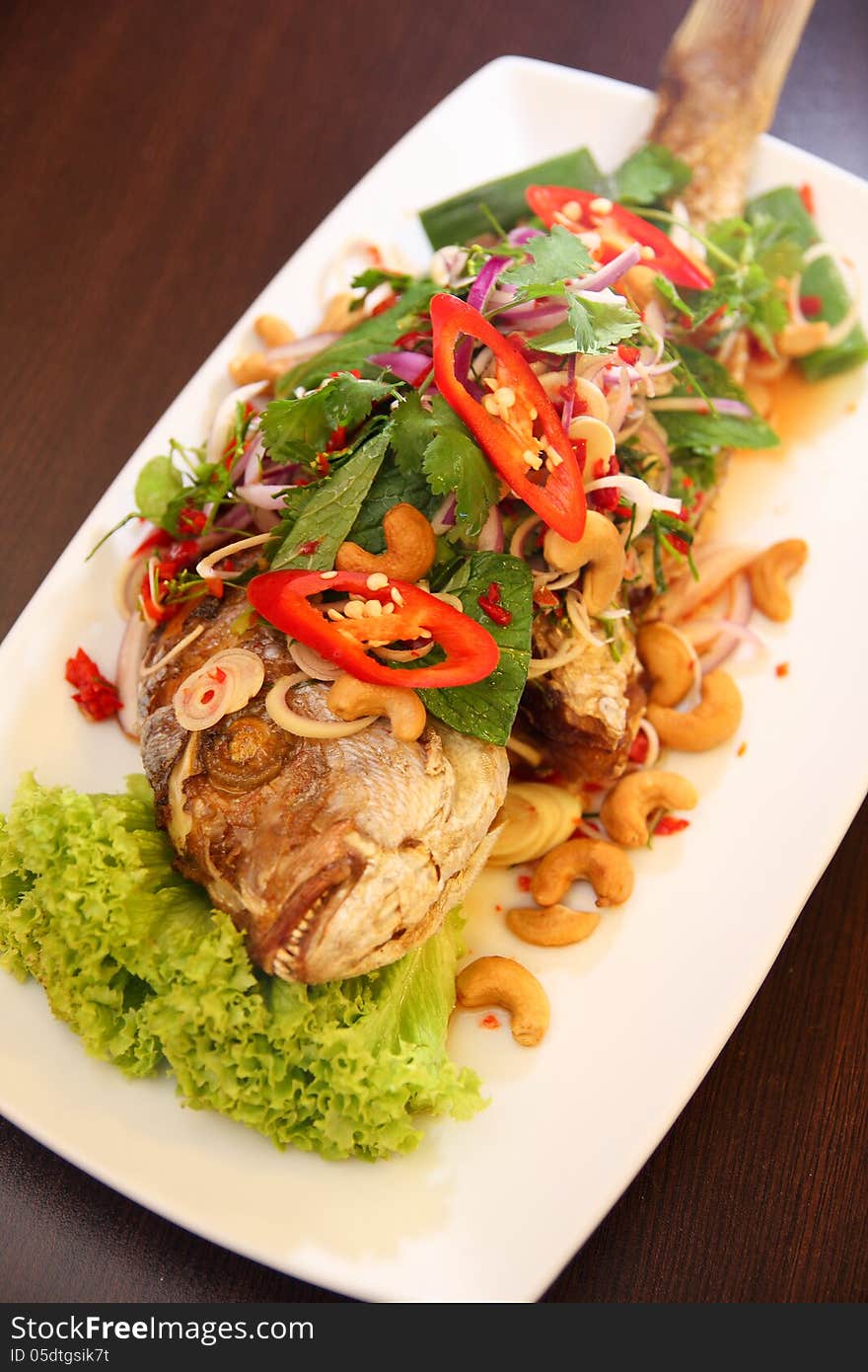 Thai deep fried fish with herb salad