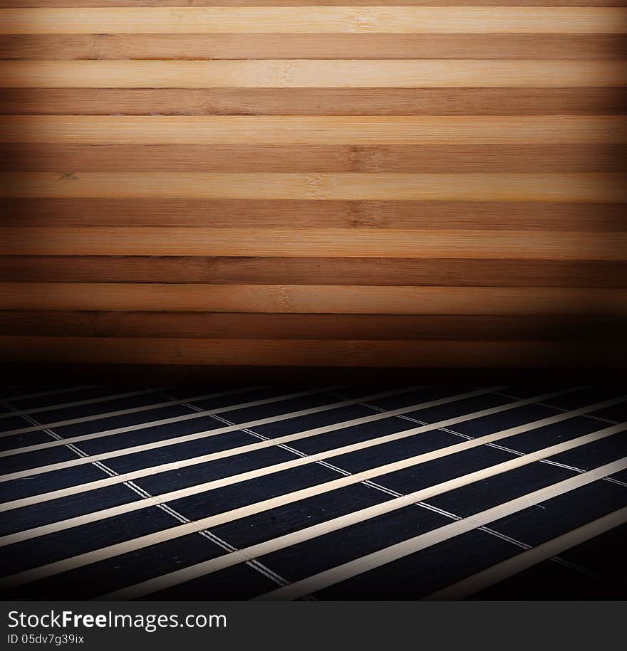 Room covered with wooden planks. Wooden walls and floor. With dark background. Room covered with wooden planks. Wooden walls and floor. With dark background