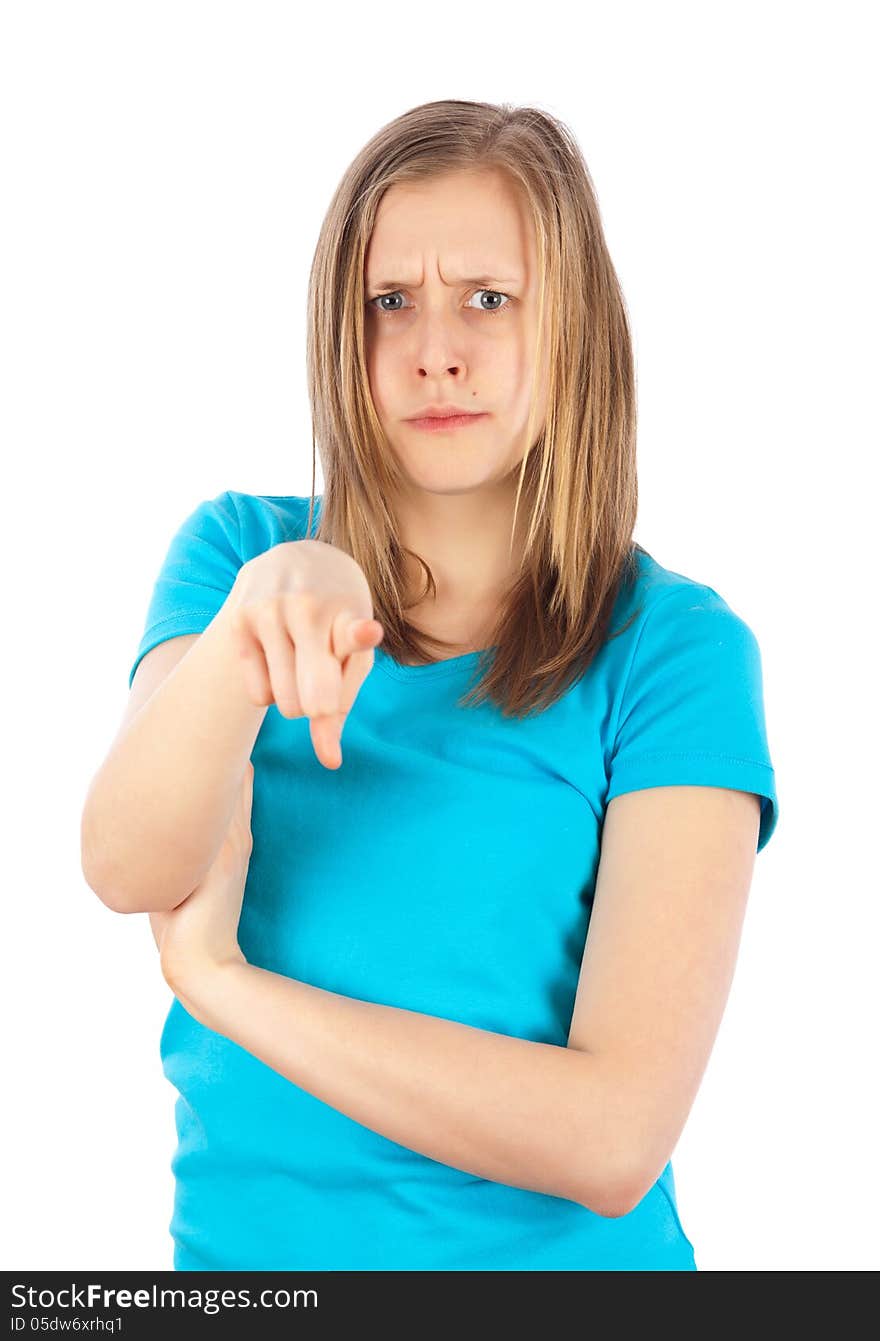 Young blond girl pointing on somebody because she is furious. Young blond girl pointing on somebody because she is furious.