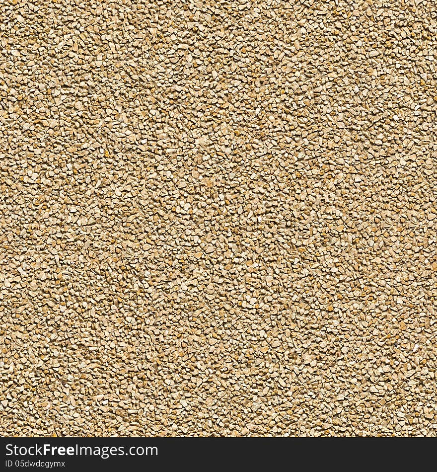 Seamless Tileable Texture of Surface Covered with Small Dark Brown Stones. Seamless Tileable Texture of Surface Covered with Small Dark Brown Stones.