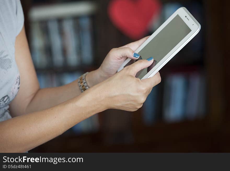 White woman hands text messaging on latest tablet note. White woman hands text messaging on latest tablet note