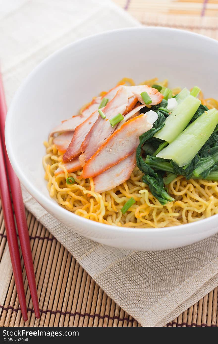 Noodles and meatball with chopsticks , asian noodle