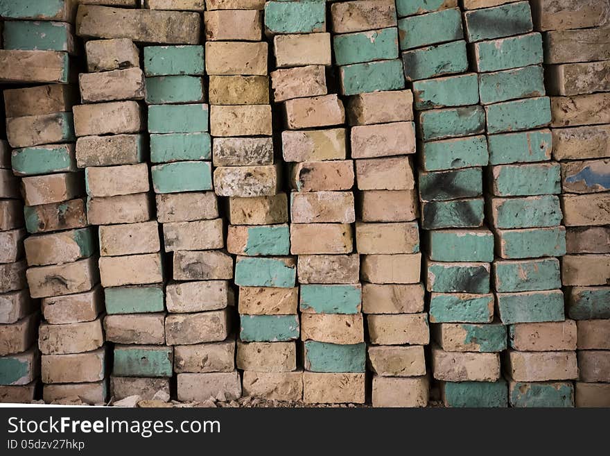 Stack of bricks painted in blue color, as background. Stack of bricks painted in blue color, as background.