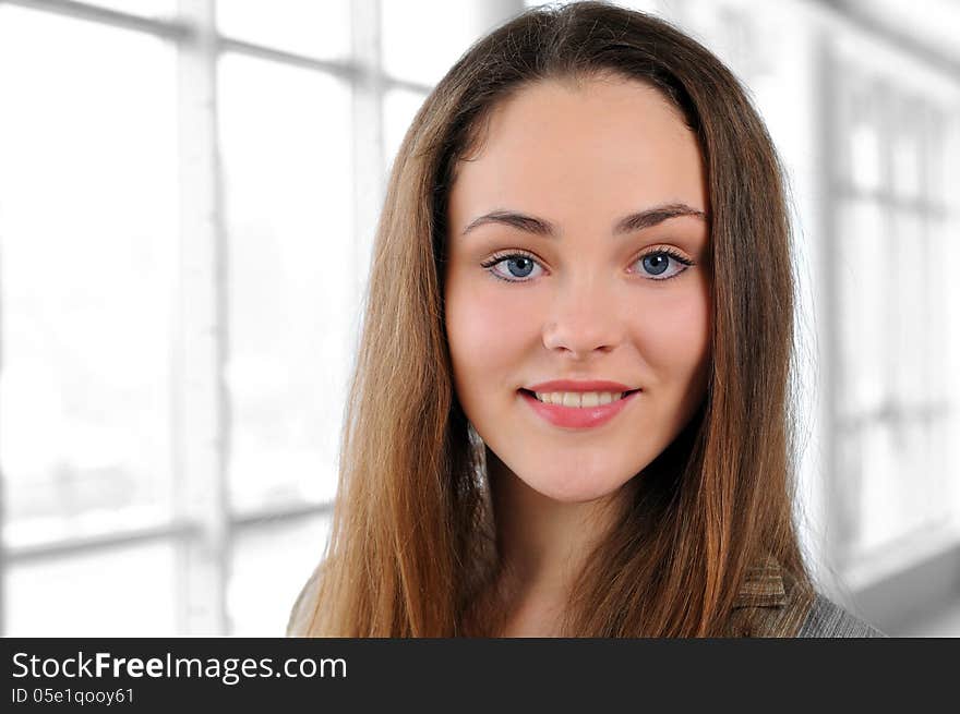 Portrait of a young girl in a business office. Portrait of a young girl in a business office