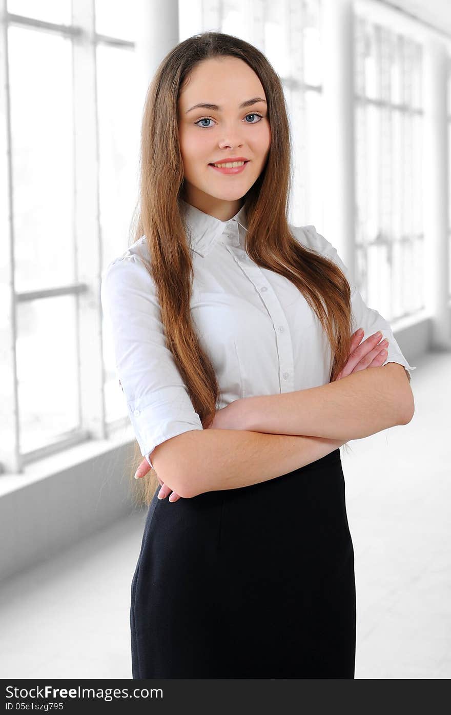 Portrait of a young girl in a business office. Portrait of a young girl in a business office