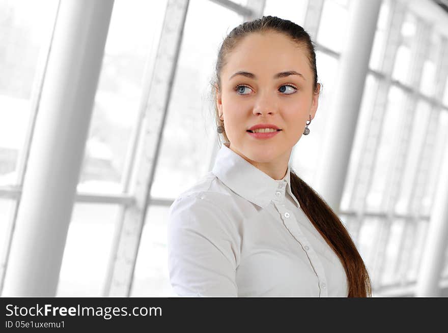 Portrait of a young girl in a business office. Portrait of a young girl in a business office