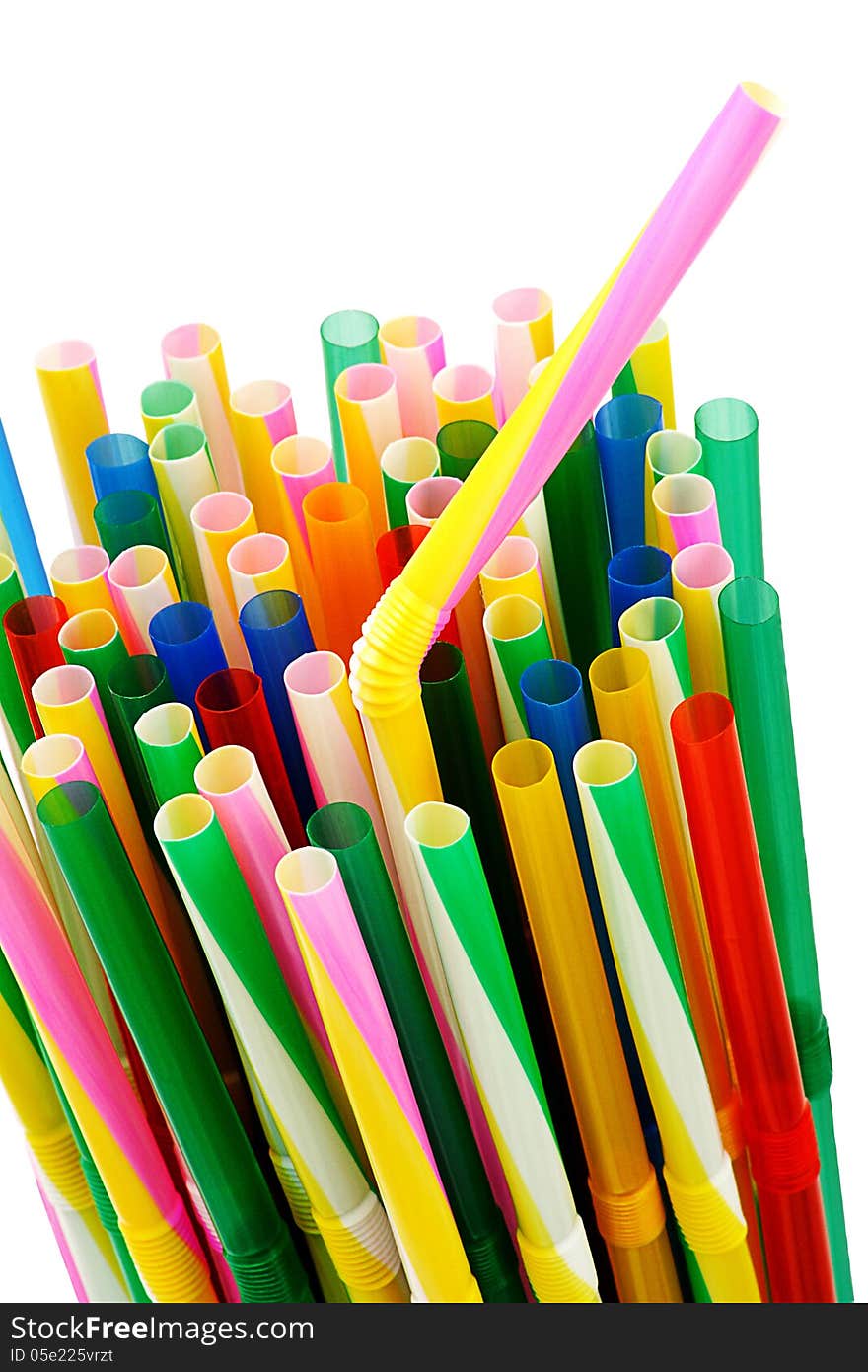 Image of a bunch of colorful plastic drinking straws on a white background. Image of a bunch of colorful plastic drinking straws on a white background.