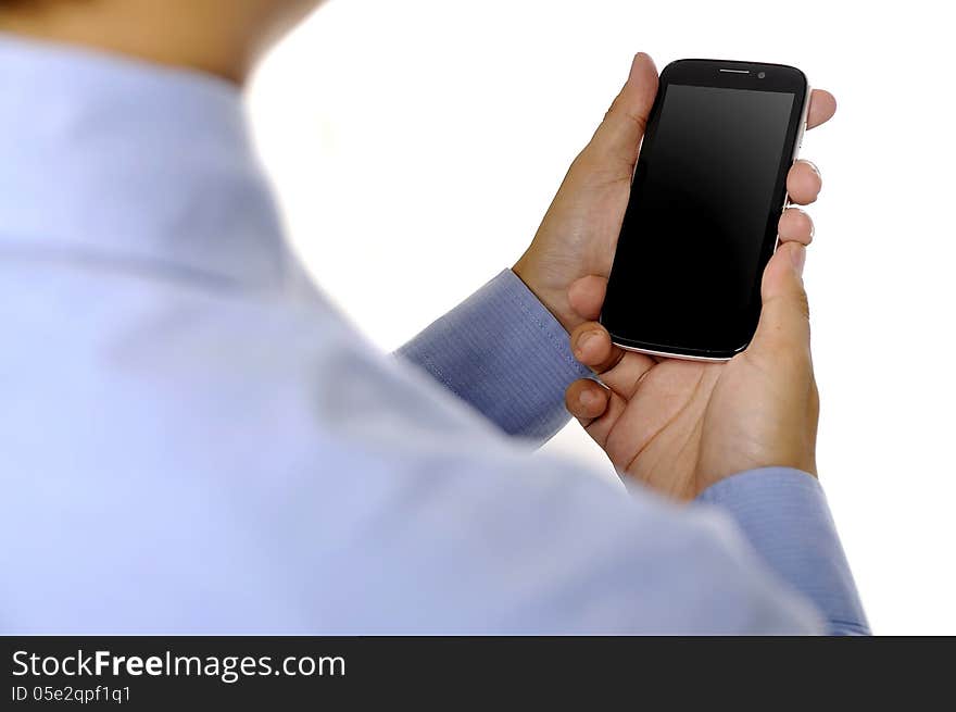 Business man holding smartphone isolated over white background