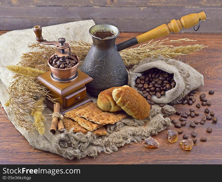 Composition with grinder, cookies and fresh coffee beans. Composition with grinder, cookies and fresh coffee beans