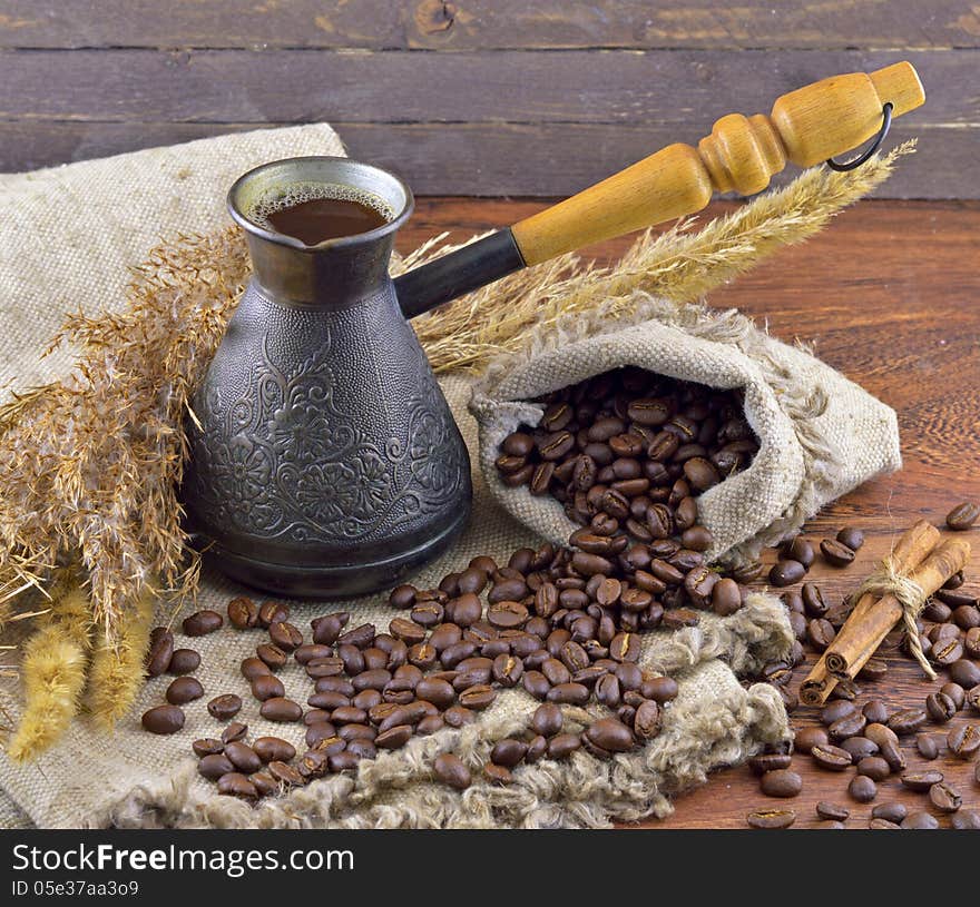 Composition with fresh coffee beans and grinder. Composition with fresh coffee beans and grinder