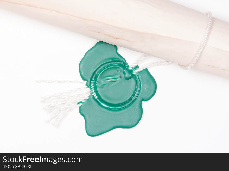 Letter is sealed with a green stamp on the bright surface. Letter is sealed with a green stamp on the bright surface