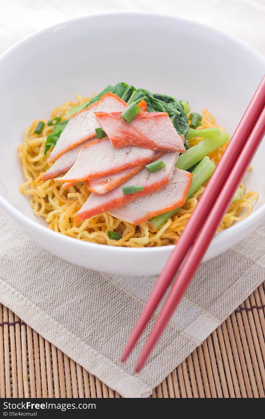 Noodles and meatball with chopsticks , asian noodle