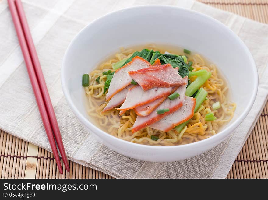 Noodles and meatball with chopsticks , asian noodle