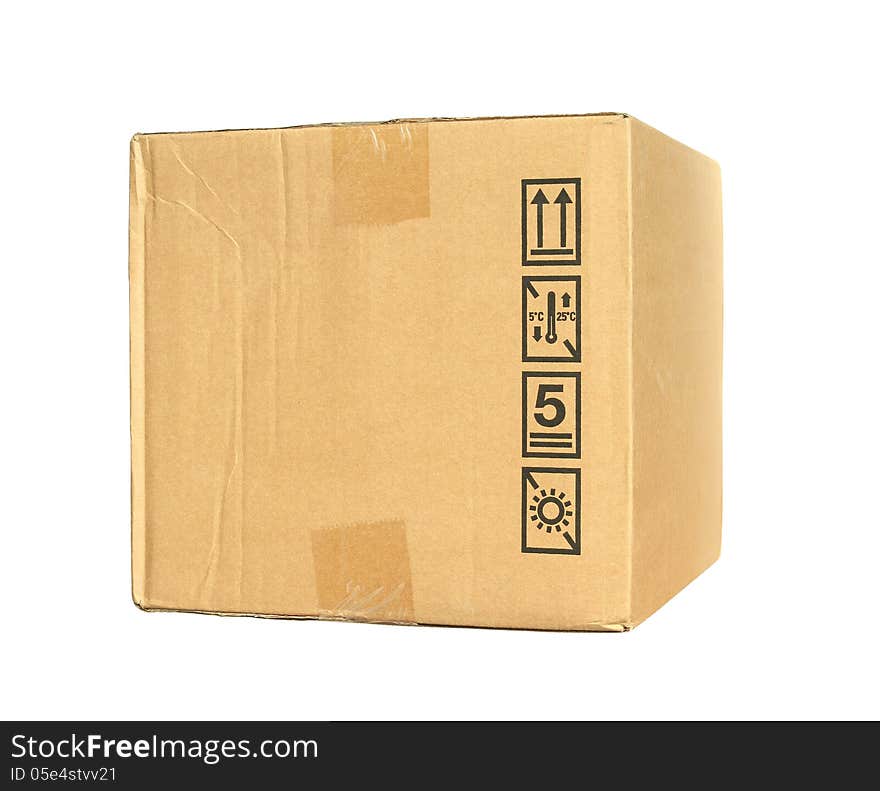 Carton box with caution symbol isolated on white background