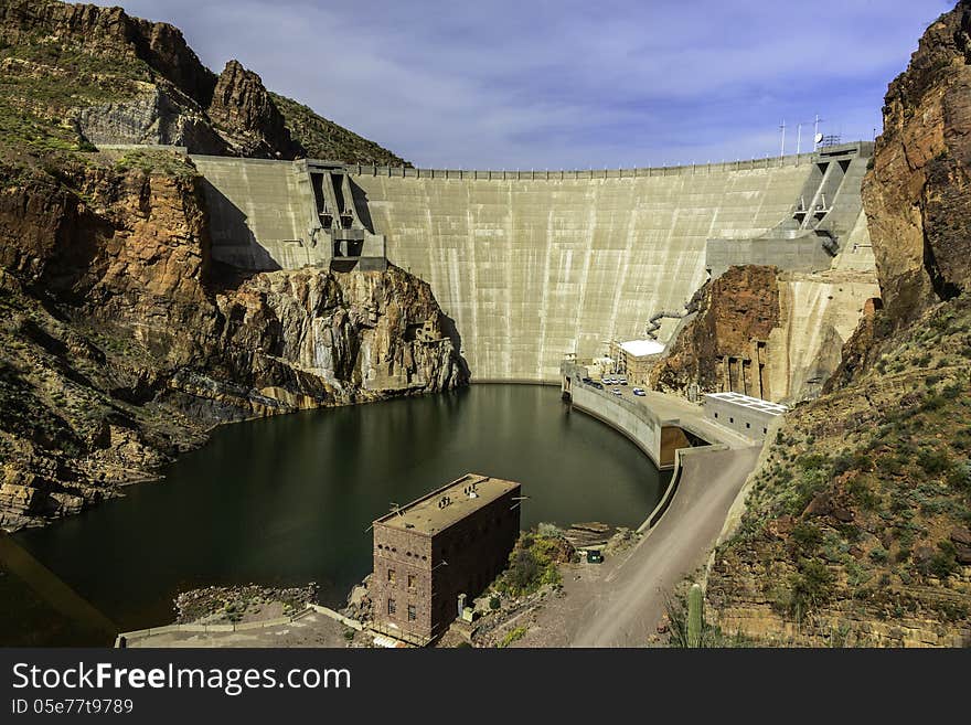 The Theodore Roosevelt Dam, located on the Salt River, northeast of Phoenix, Arizona in the Tonto National Forest. This hydroelectric dam is 367 feet high and forms the Theodore Roosevelt Lake as its supply. This dam can generate 36 megawatts of energy.