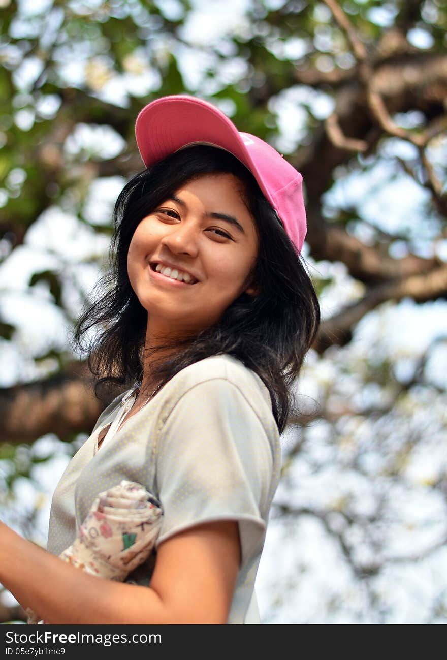 Portrait of a young asian beautiful woman on the nature