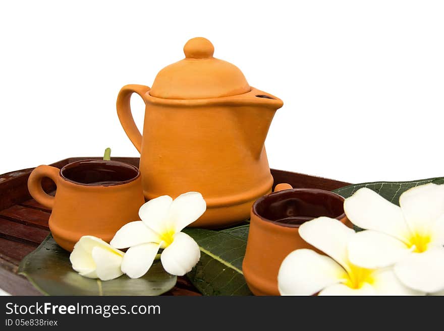 Asian tea set with flower.