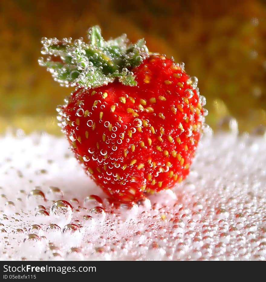 Strawberry in a bubble of mineral water. Strawberry in a bubble of mineral water