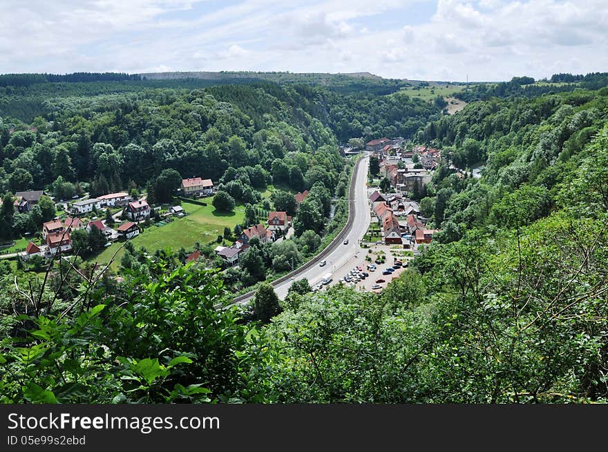 Ruebeland is a village in the collective municipality of Elbingerode in the district of Harz in the German state of Saxony-Anhalt. Ruebeland is well known for hiking tours in Germany and part of Harzer Hexenstieg. Image shows view to Ruebeland from mountain Schöne Aussicht. Ruebeland is a village in the collective municipality of Elbingerode in the district of Harz in the German state of Saxony-Anhalt. Ruebeland is well known for hiking tours in Germany and part of Harzer Hexenstieg. Image shows view to Ruebeland from mountain Schöne Aussicht.