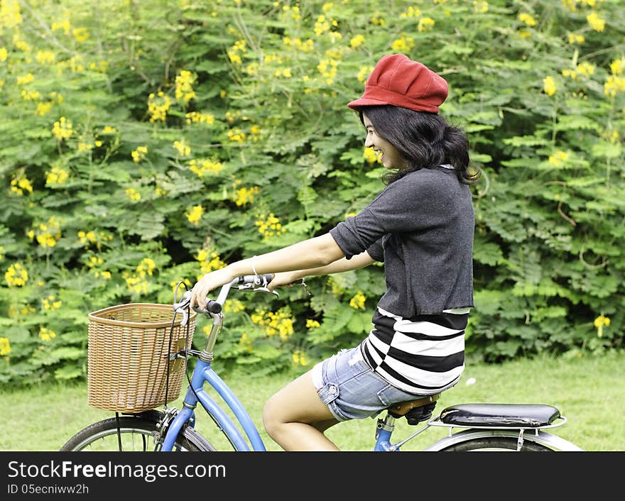 Young woman cycling and having fun