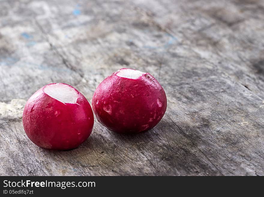 Fresh radish on wooden table ,close up