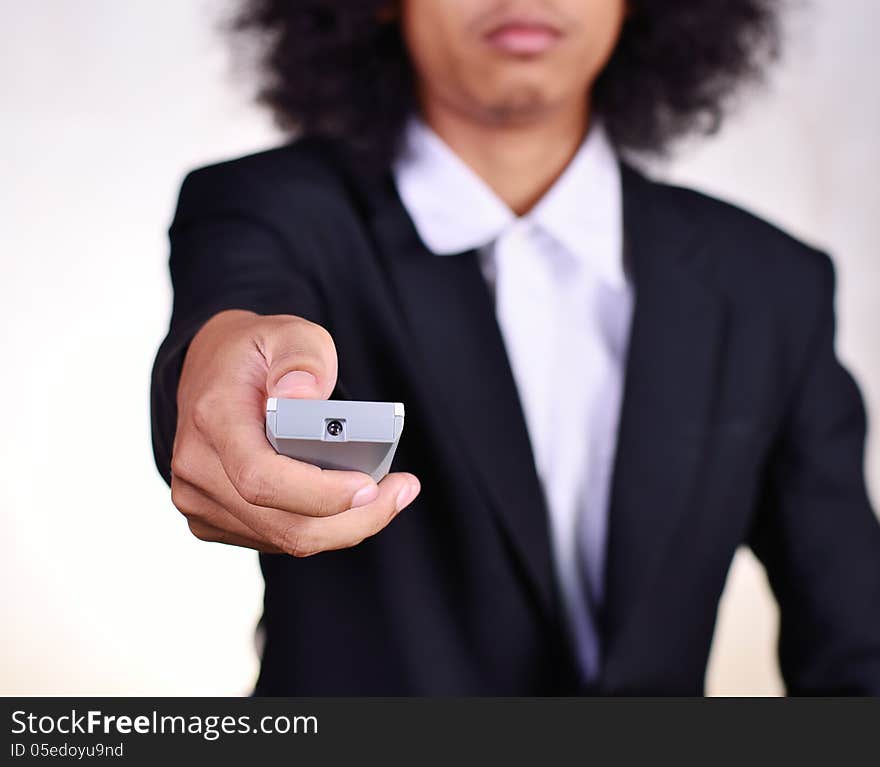 Close up a man holding remote control