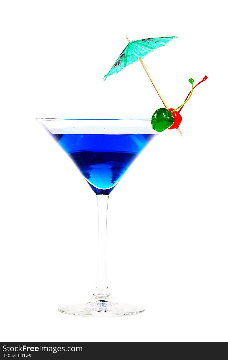 Blue cocktail with berries