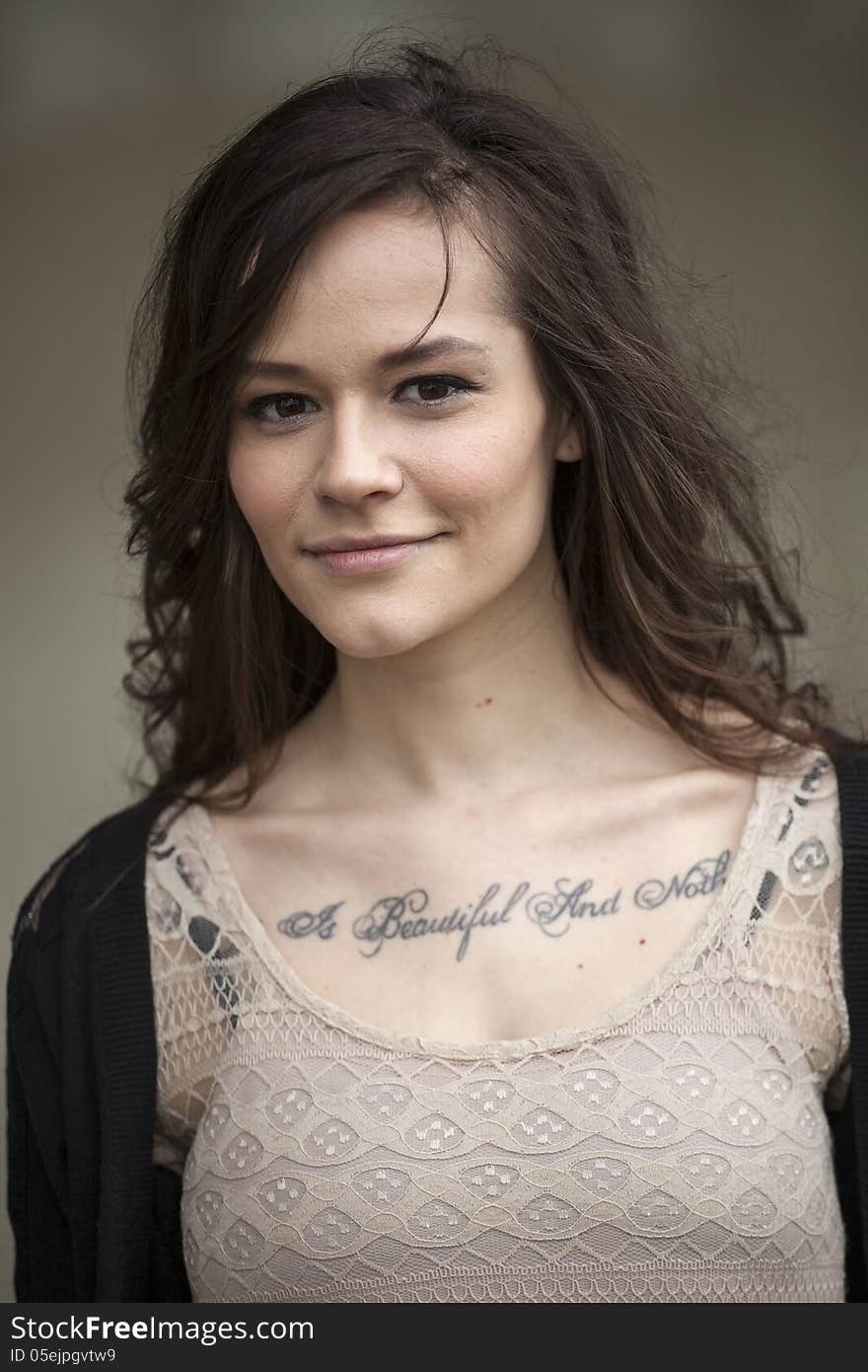 Portrait Of Beautiful Young Woman With Brown Hair