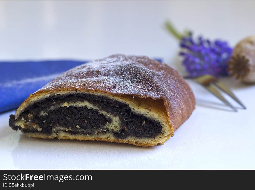 Cake with poppy seeds on the table. Cake with poppy seeds on the table