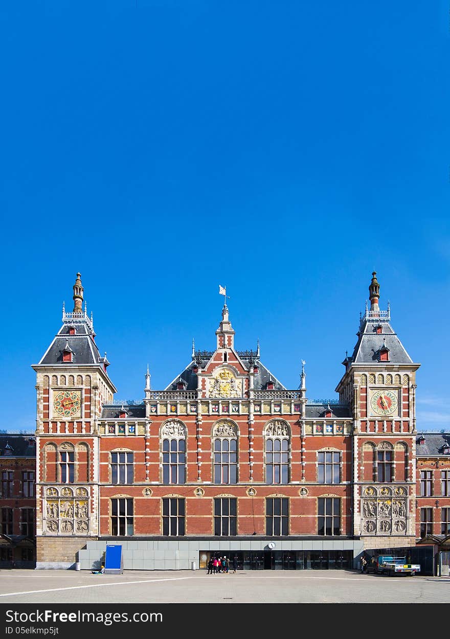 Main Building of the Amsterdam Central Train Station after the rushing hours at Amsterdam, Netherlands