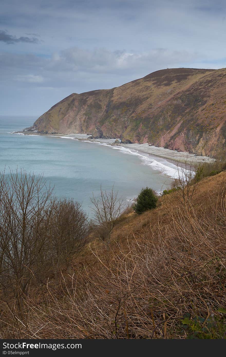 Lynmouth Bay Devon, England, view towards Foreland Point, Blackhead and Butter Hill. On the north edge of Exmoor and on the South West Coast Path. Lynmouth Bay Devon, England, view towards Foreland Point, Blackhead and Butter Hill. On the north edge of Exmoor and on the South West Coast Path