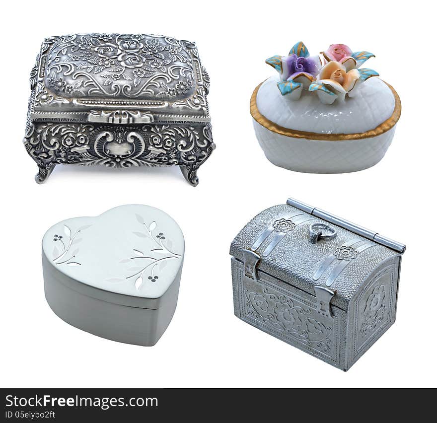 Metal and porcelain decorative boxes isolated. Metal and porcelain decorative boxes isolated