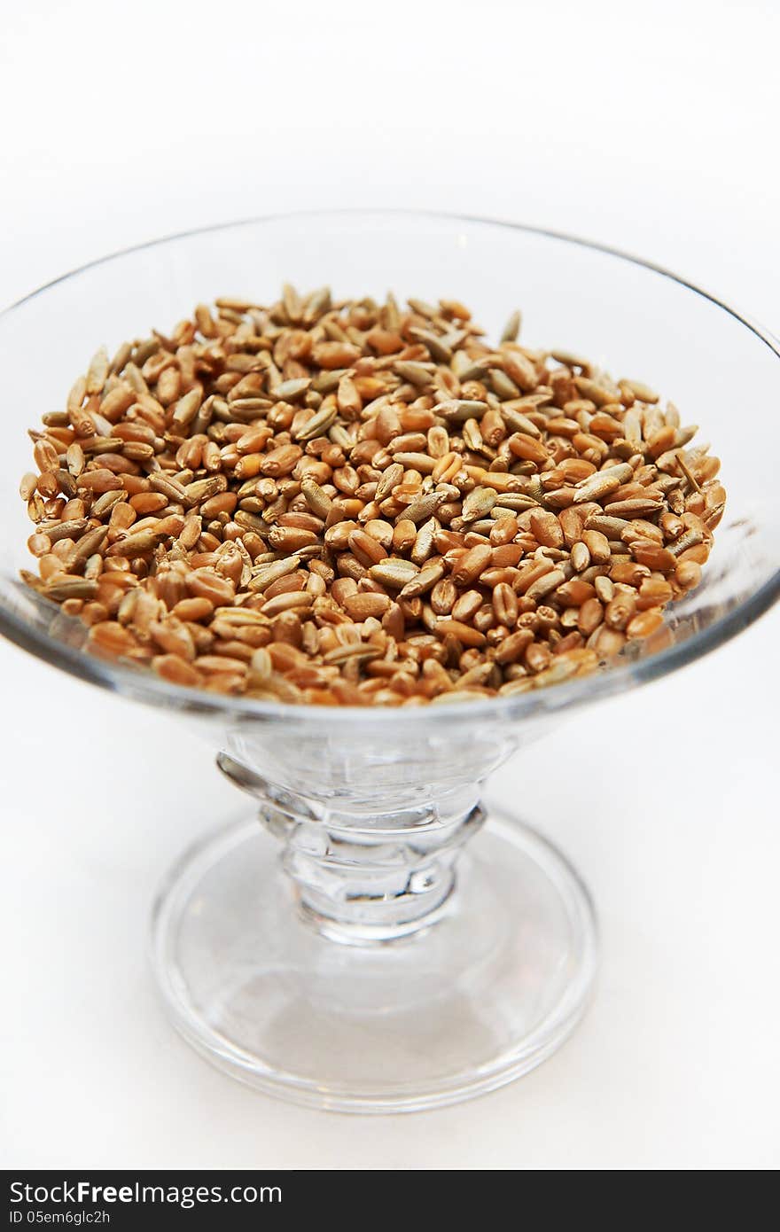 Wheat grain in a glass bowl