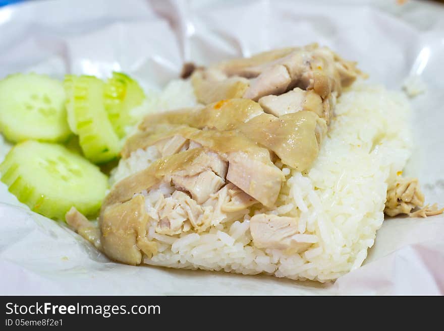 Hainanese chicken rice, steamed chicken and white rice