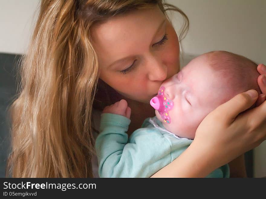 Happy young parent and a baby. Happy young parent and a baby