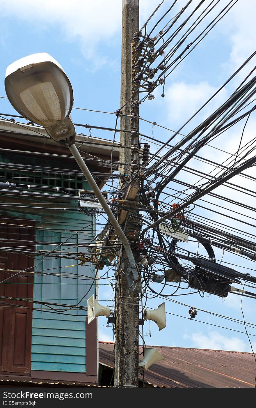 Electric wire disorganized on electric pole, danger