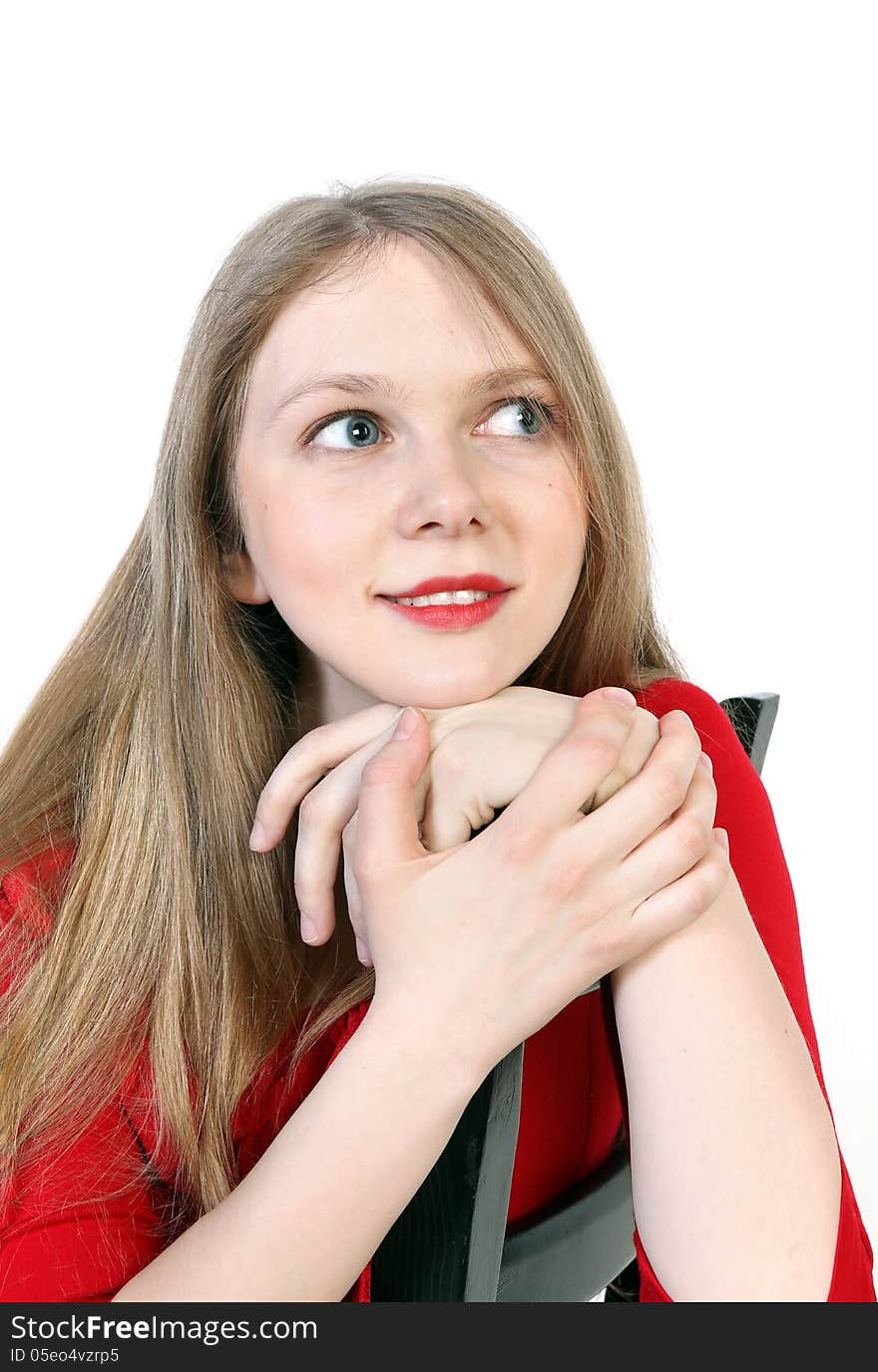 Close up studio portrait of beautiful young woman sitting on white background. Close up studio portrait of beautiful young woman sitting on white background