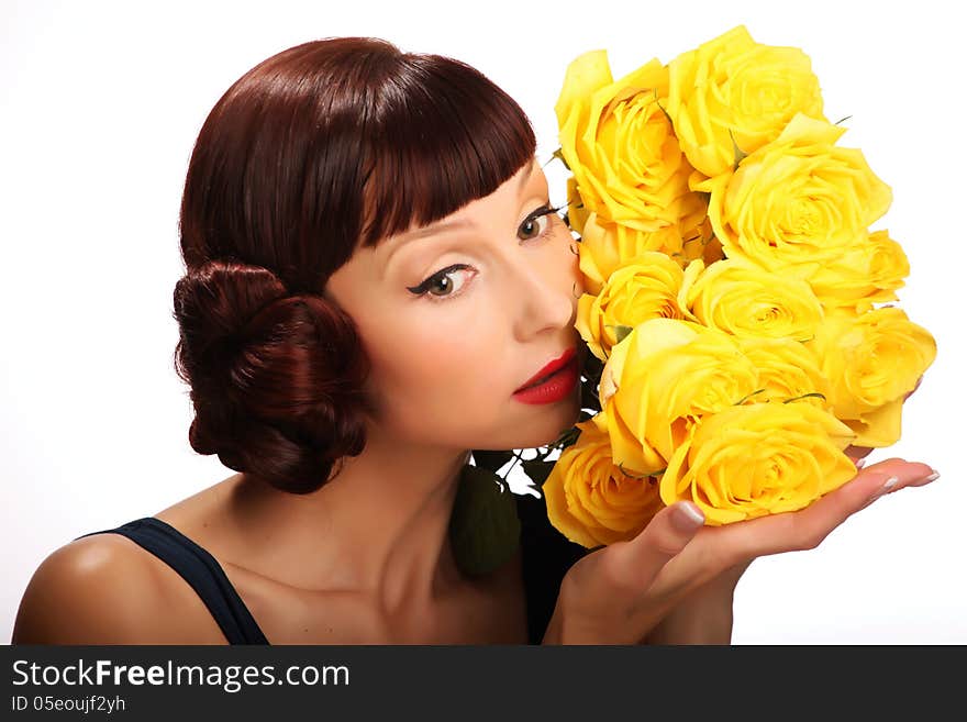 The girl with a bouquet of yellow roses. The girl with a bouquet of yellow roses