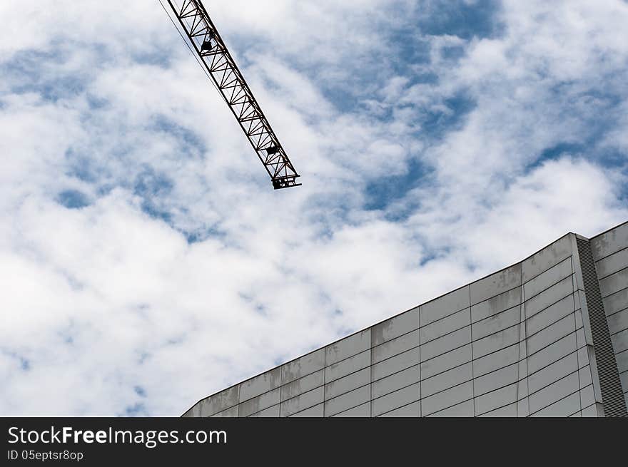 Tower Crane and Modern Architecture on Blue sky