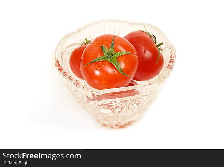 Tomatoes In A Glass Vase