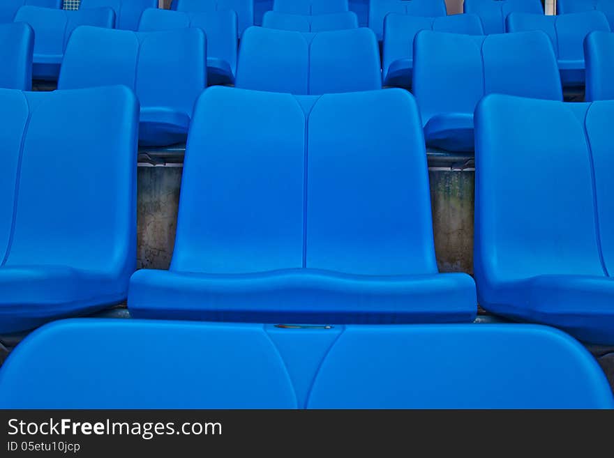 Blue plastic chairs in football stadium.thailand. Blue plastic chairs in football stadium.thailand