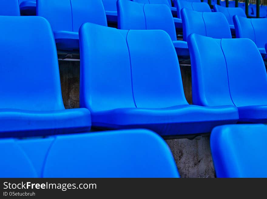 Blue plastic chairs in football stadium.thailand. Blue plastic chairs in football stadium.thailand