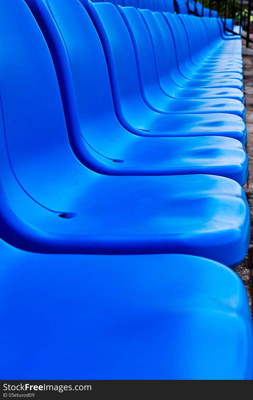 Blue plastic chairs in football stadium.thailand. Blue plastic chairs in football stadium.thailand