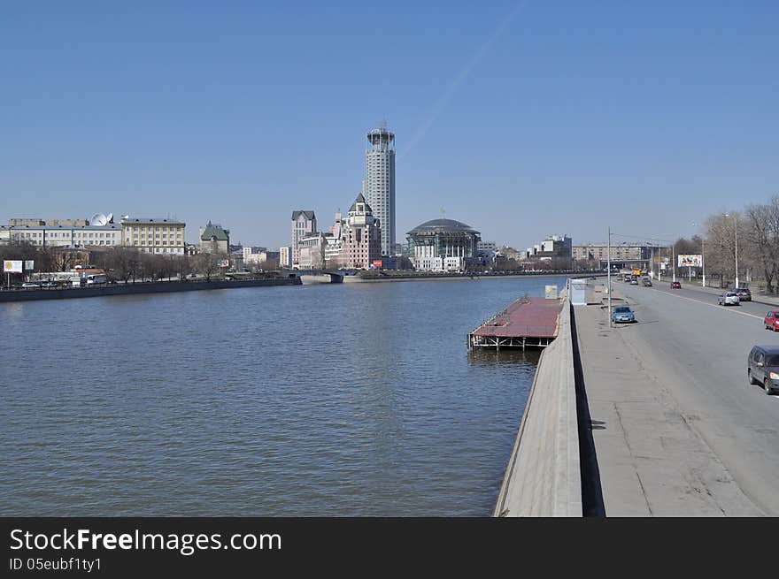 The Moscow quay. April morning. Modern building of the business centre.