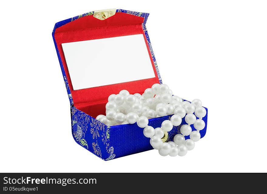 Small Casket with a necklace from pearls of dark blue colour, separately on a white background. Small Casket with a necklace from pearls of dark blue colour, separately on a white background