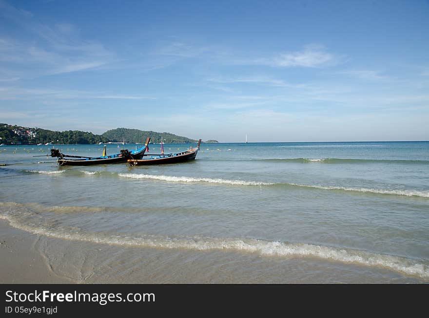 Tropical beach with boat