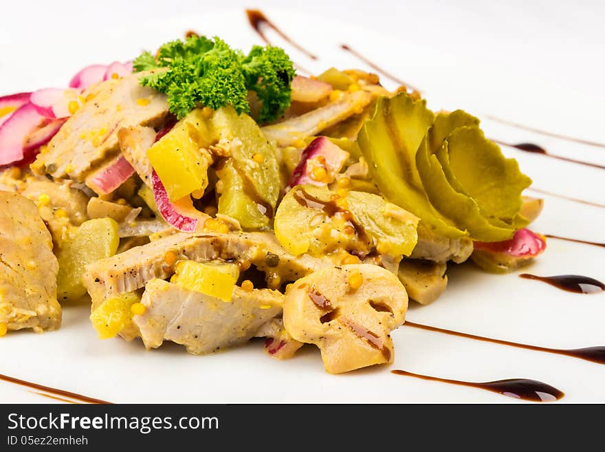 Meat salad with mushrooms, radish and pickled cucumber