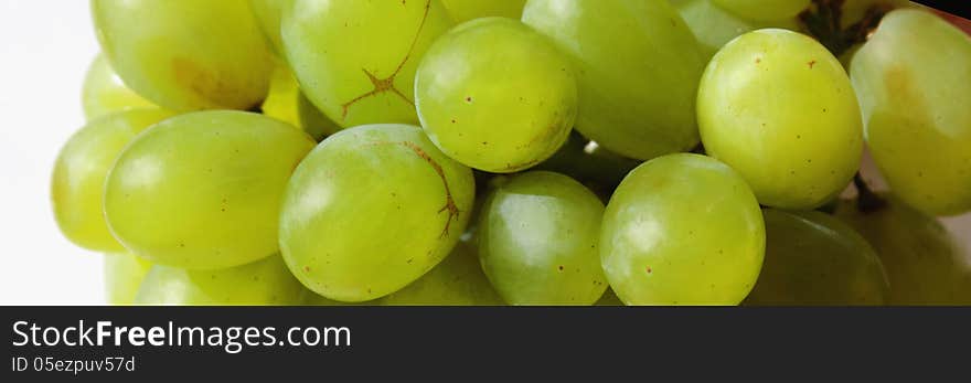 Bunch of grapes on a light background