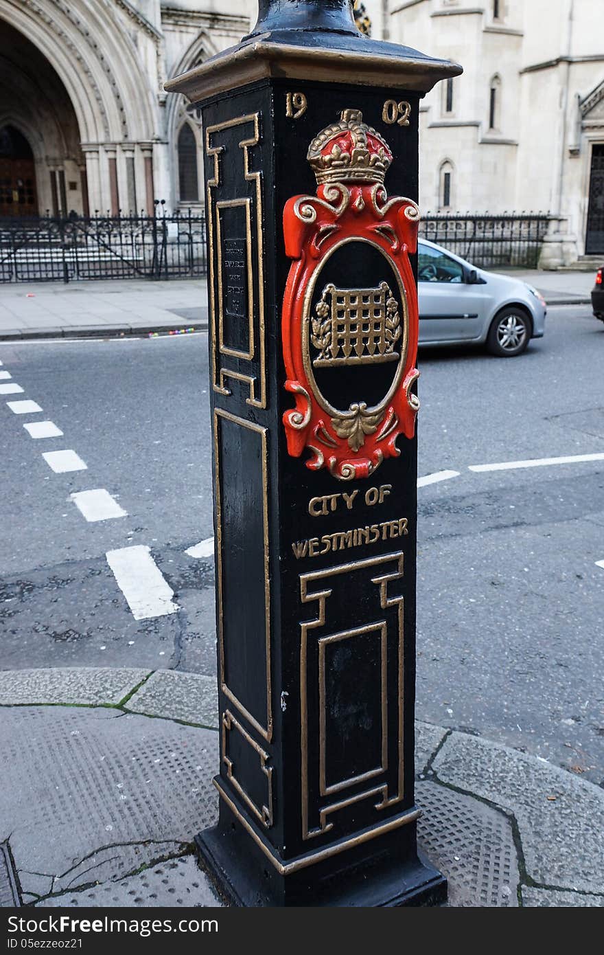 Old post showing the area of the city Westminster and coat of arms, London, UK. Old post showing the area of the city Westminster and coat of arms, London, UK