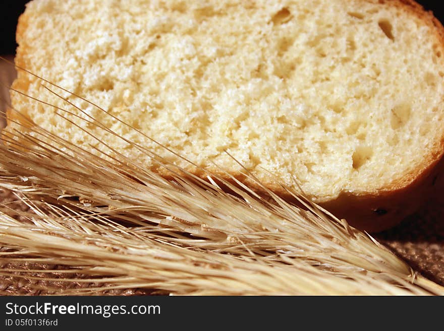 Bread and wheat ears (details)